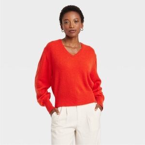 New, red sweater. Medium and small